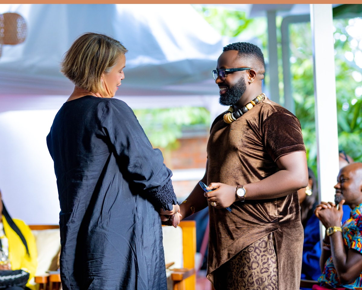 Patrcik Muhire greets High Commissioner Alison Thorpe (1)