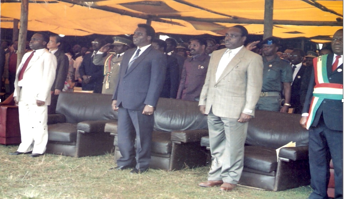 Attending an event in Ruhengeri in around 1984. Z (standing in beige suit second left) next to President Habyarimana (centre). On the front left is Z’s protege Joseph Nzirorera. On the row behind, between Z and Habyarimana is the ever-watchful Col. Elie Sagatwa – Z’s brother. Note: everyone is wearing a lapel pin with a picture of the President (a legal requirement) - except for Z. Loyalty to Z and his needs was, for those chosen by him, the way to immediate prosperity far more than to the President and state.