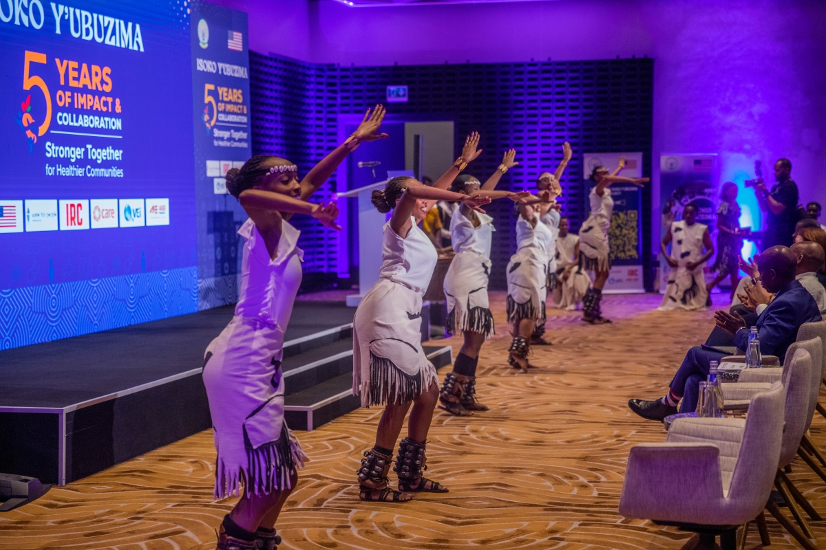 Traditional dancers entertain guests during the Isoko y'Ubuzima project closeout event, celebrating five years of expanding access to clean water, sanitation and healthier communities. Photo by Craish Bahizi.