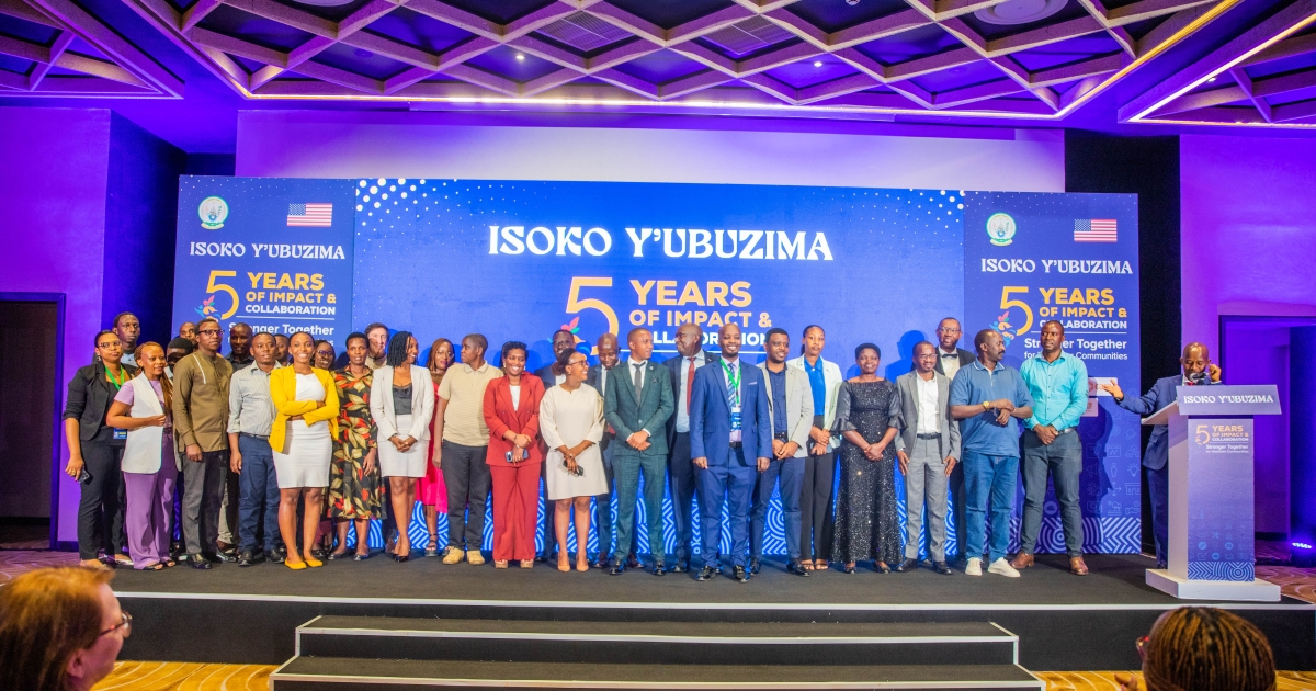 Staff pose for a group photo at the Isoko y’Ubuzima project closeout event celebrating water and sanitation achievements, on June 24, 2026 in Kigali. Photo by Craish Bahizi.