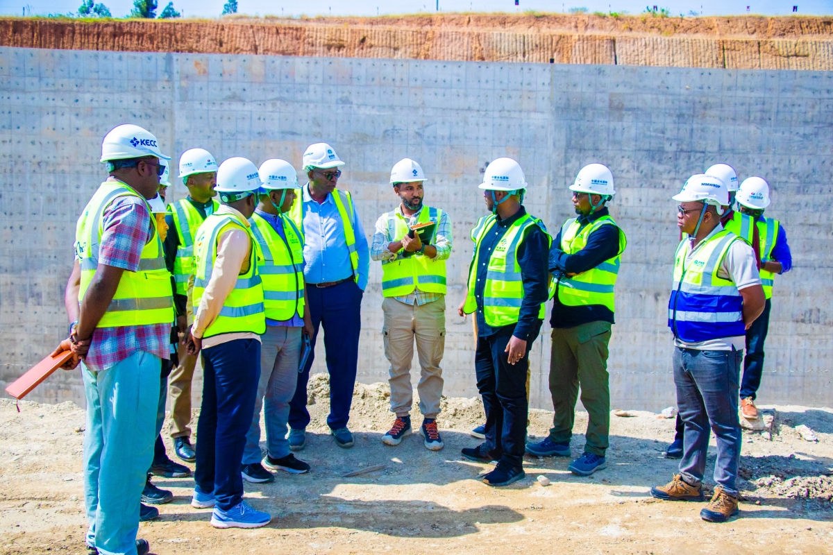 Official during a tour of the ongoing works to the Muvumba Multipurpose Dam Project.