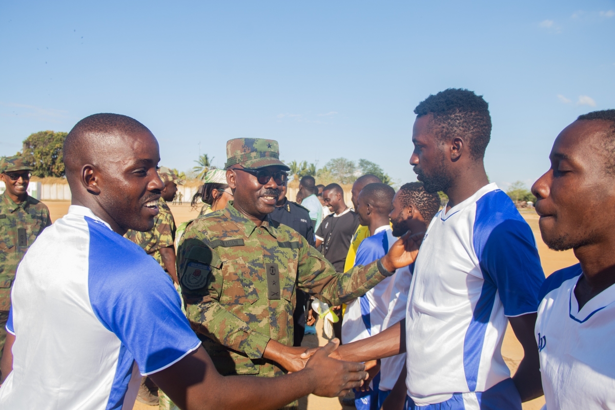 Joint Task Force Commander Brig Gen Cooper Mujuni opens a friendly game between Rwandan forces and local community during a Liberation Day.