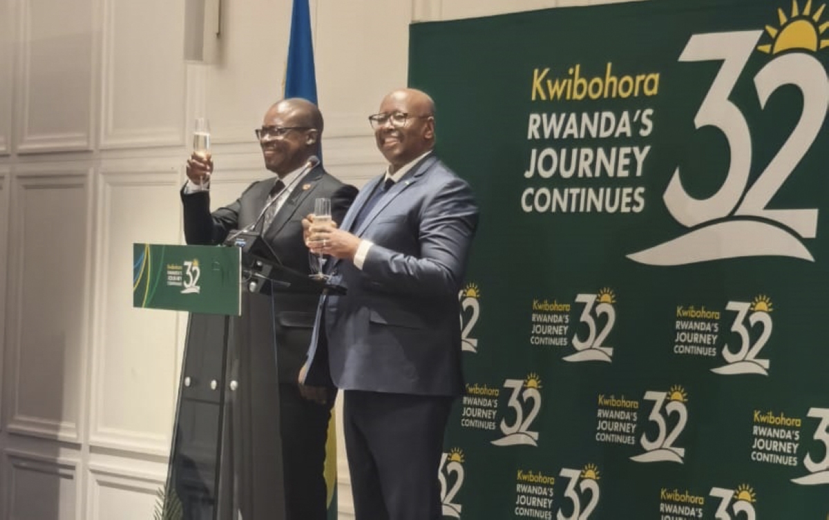 Foreign Affairs and International Trade Minister, Amon Murwira and Rwanda's Ambassador to Zimbabwe James Musoni during the celebrations of the 32nd anniversary of the Liberation Day in Harare on Monday, July 6.