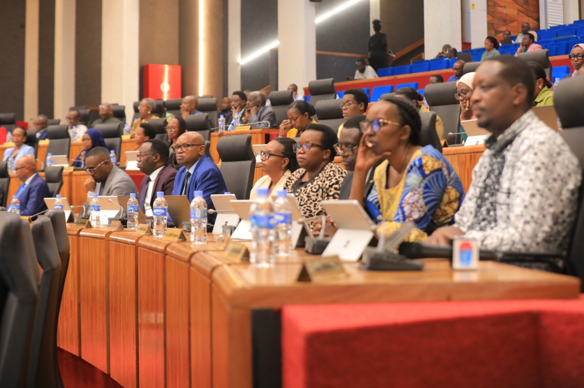 Members of Parliament follow Prime Minister Nsengiyumva's presentation.