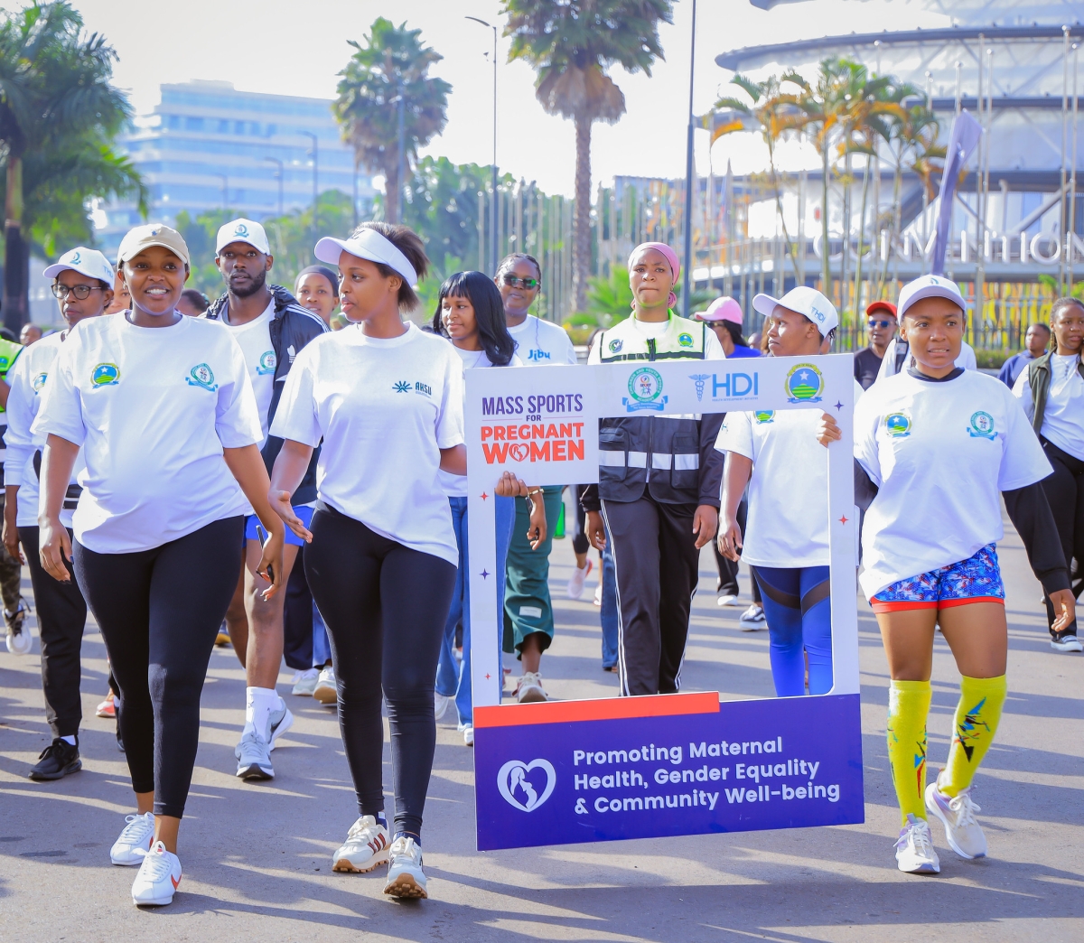 Participants march during an awareness campaign for promoting safe maternal health. Courtesy