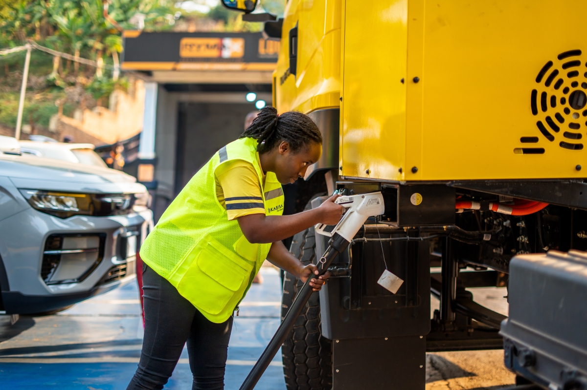 A fully electric heavy-duty truck at a charging station