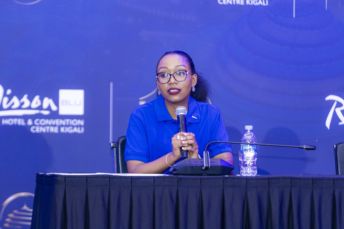 Nice Uwase, Acting General Manager at Radisson Blu Hotel and Kigali Convention Center addresses delegates during the event.