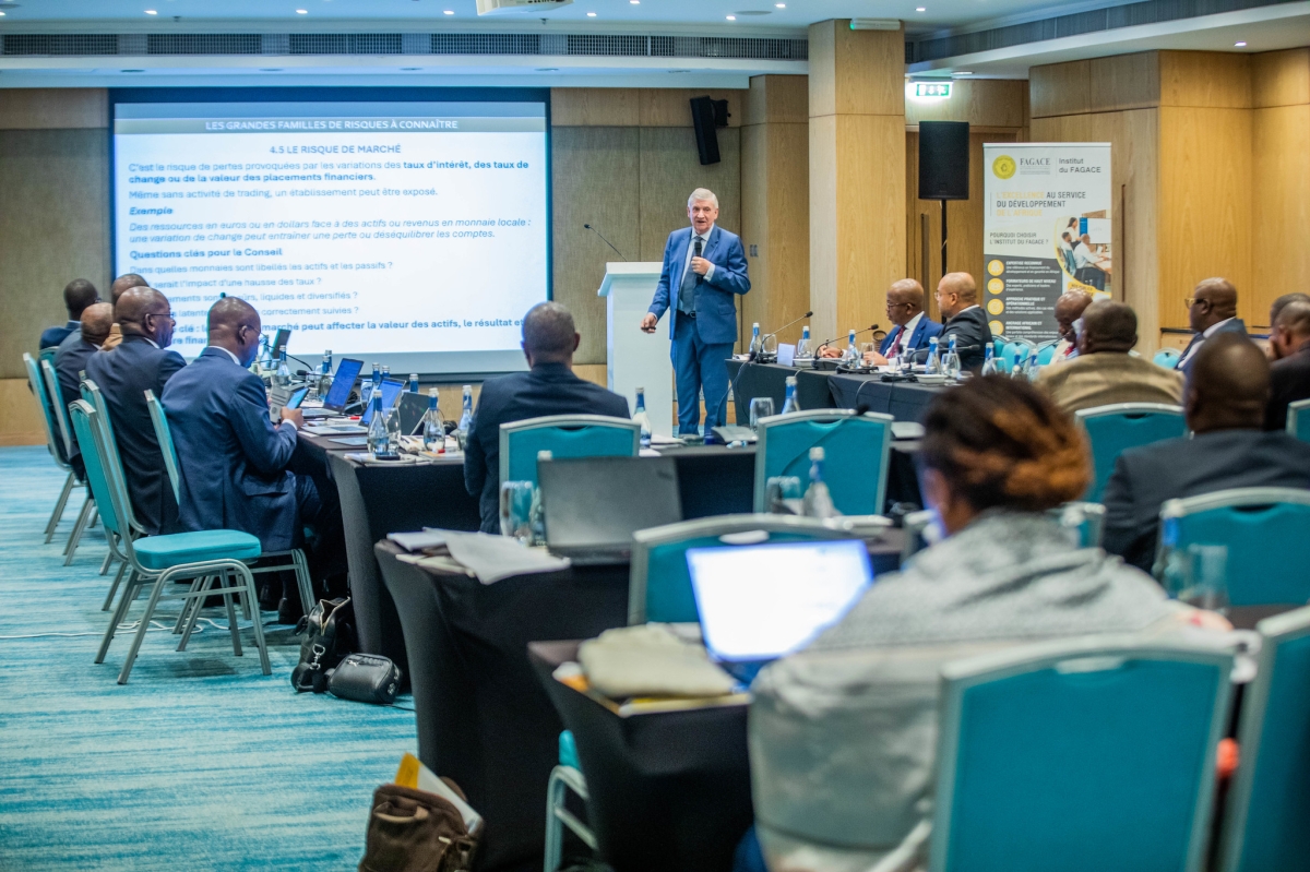 Participants follow a presentation at the African Guarantee and Economic Cooperation Fund (FAGACE) meeting in Kigali.