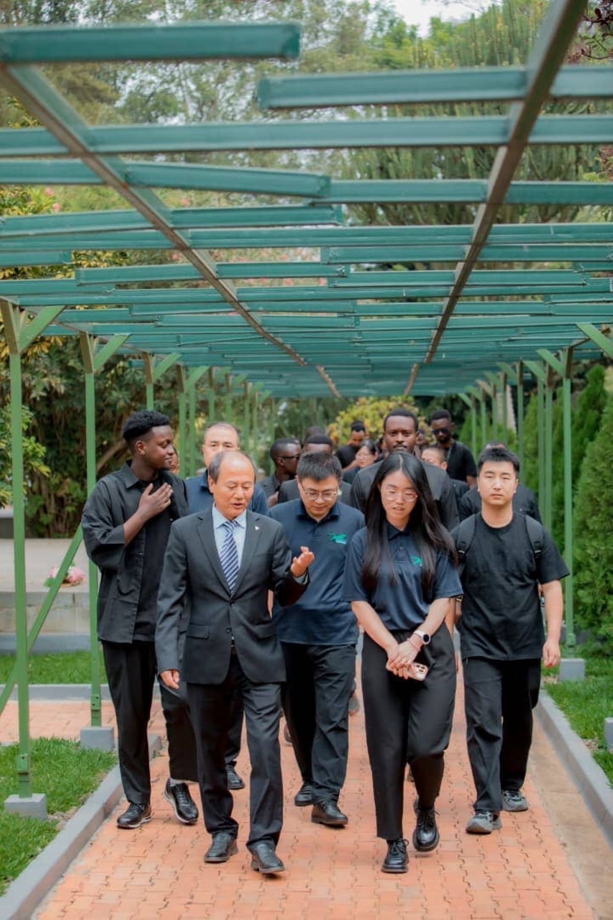 Mourners during a tour of different sections of the memorial.