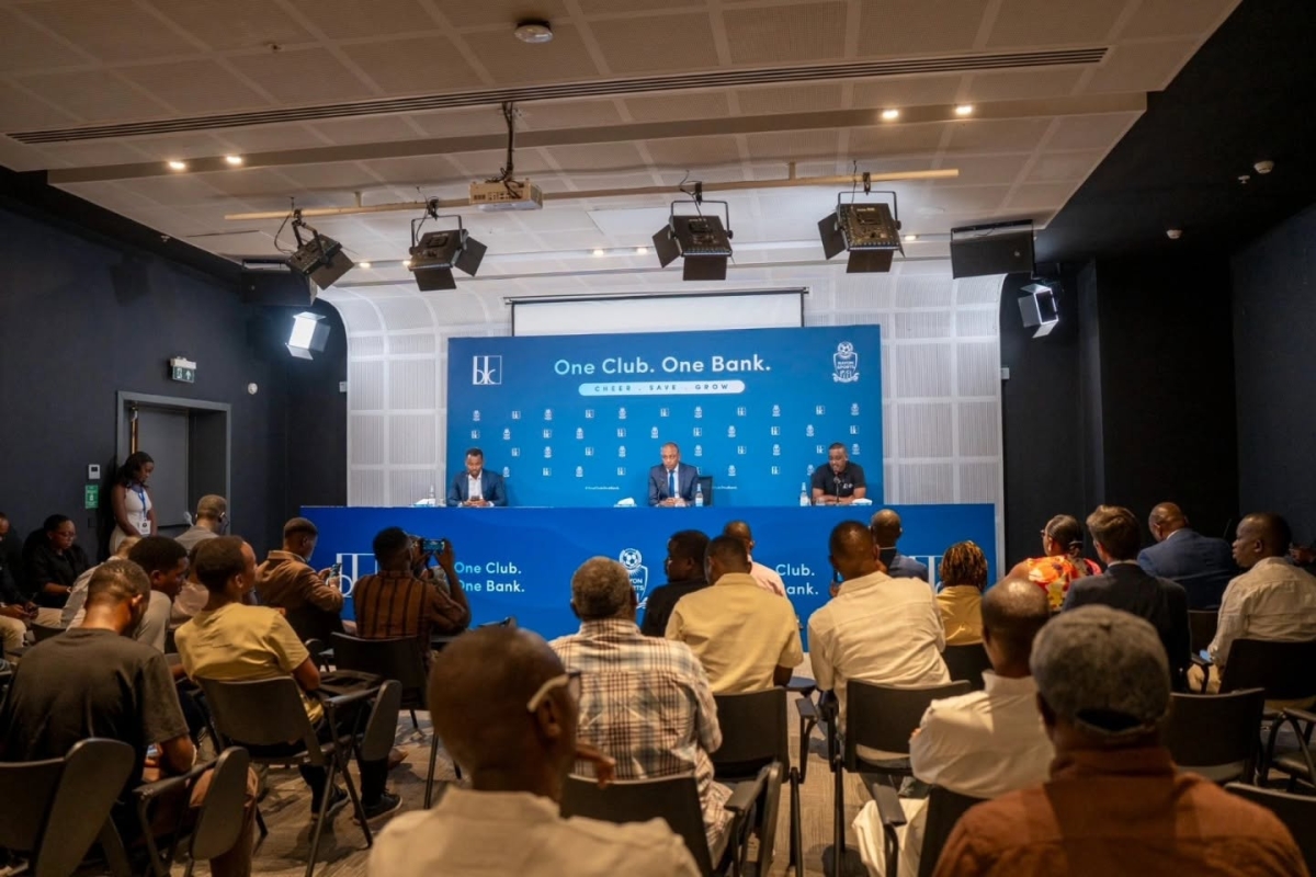 Journalists attend the signing ceremony