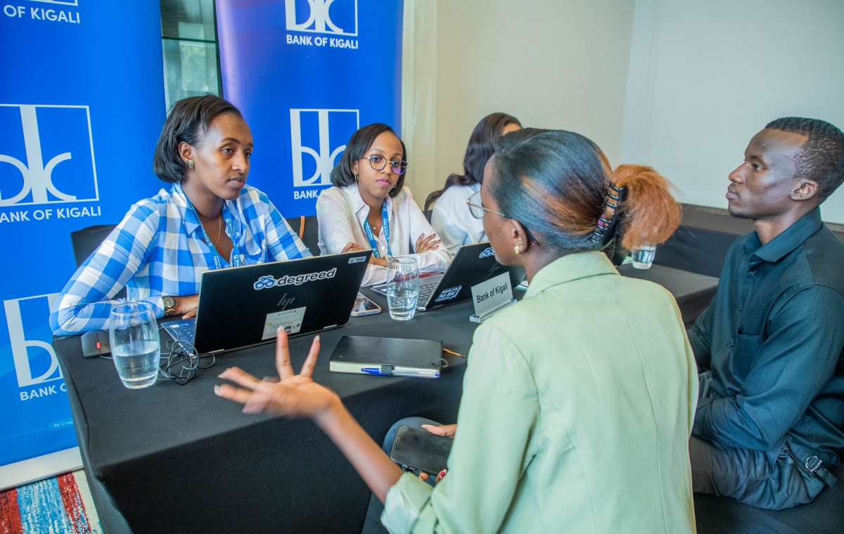 Students interact with Bank of Kigali staff during the fourth RICA Job Fair in Kigali on Friday, July 17.