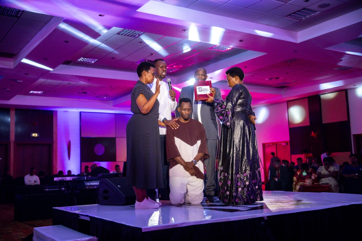 Bosco Nshuti was dedicated in prayer following the official launch of his fifth album at Kigali Serena Hotel. Photo by Emmanuel Dushimimana