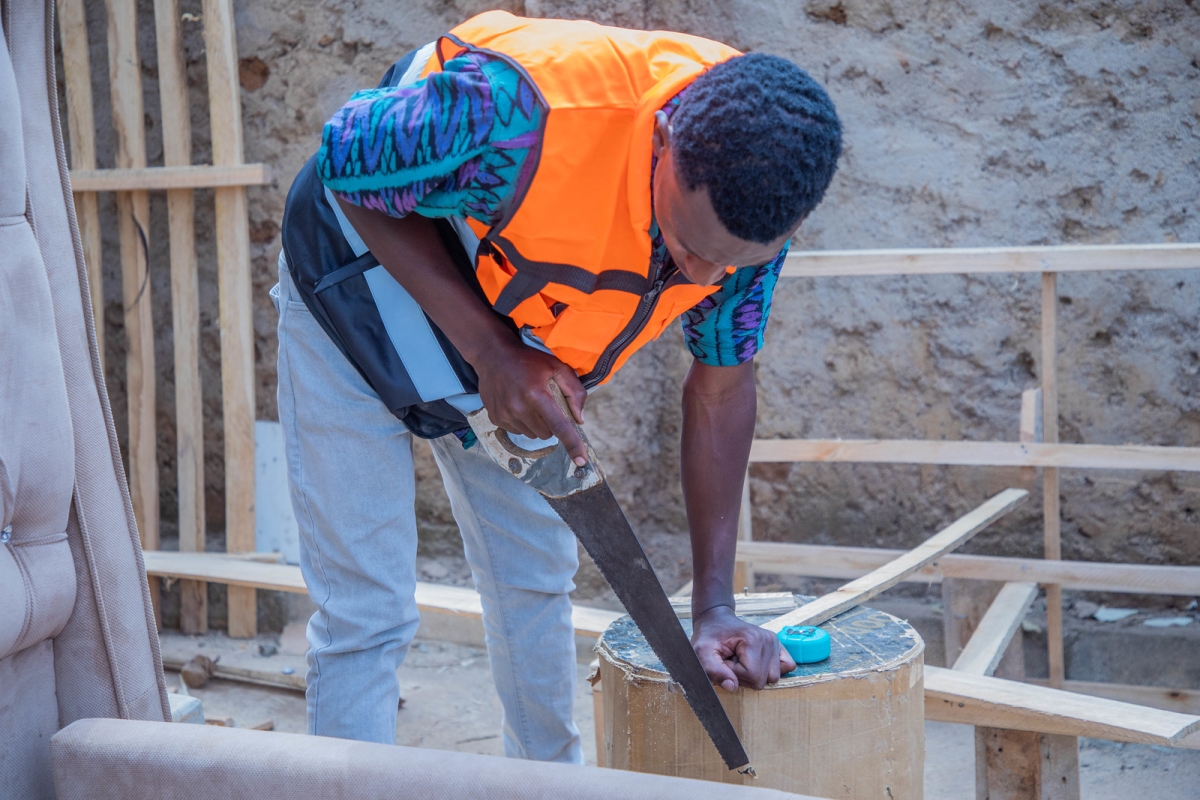 Gasangwa on the job. The workshop has helped him replace drugs with purpose.