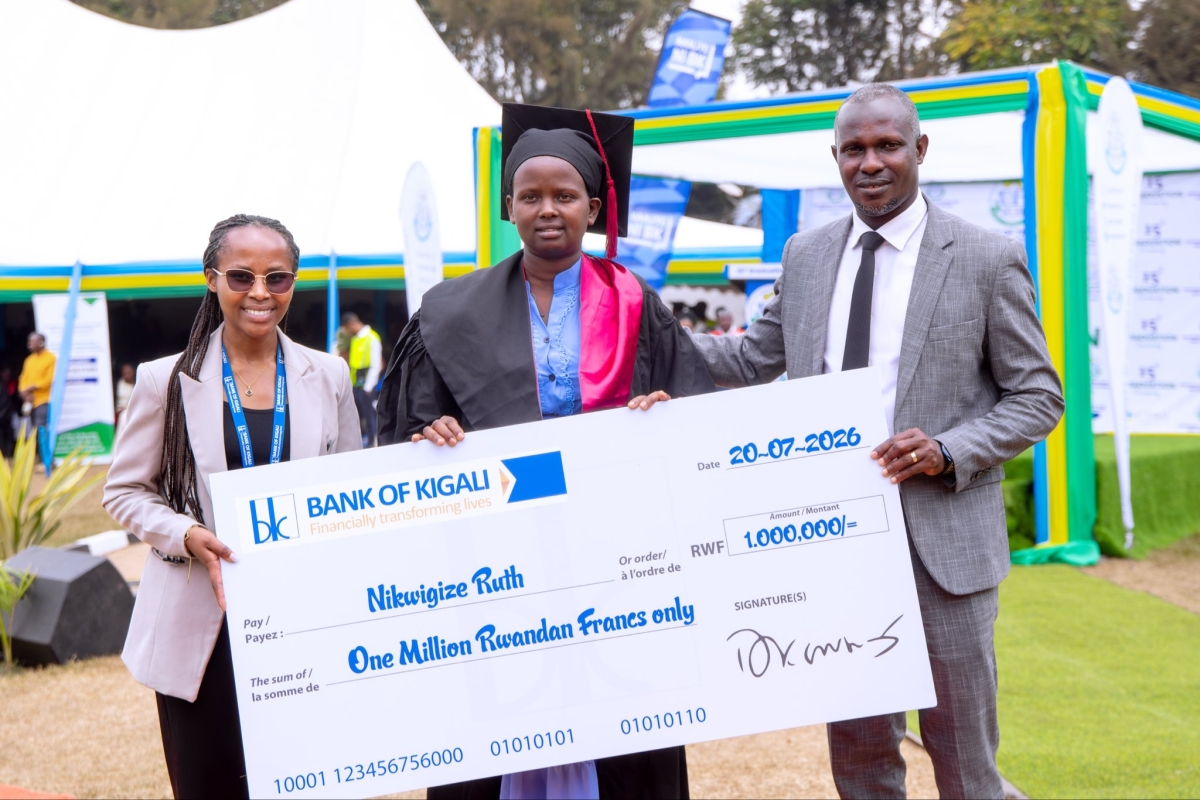 A top performer Ruth Nikwigize recieves her awards. The awards were presented during UTAB's 15th graduation ceremony, where 1,474 students graduated from various academic programmes. Courtesy