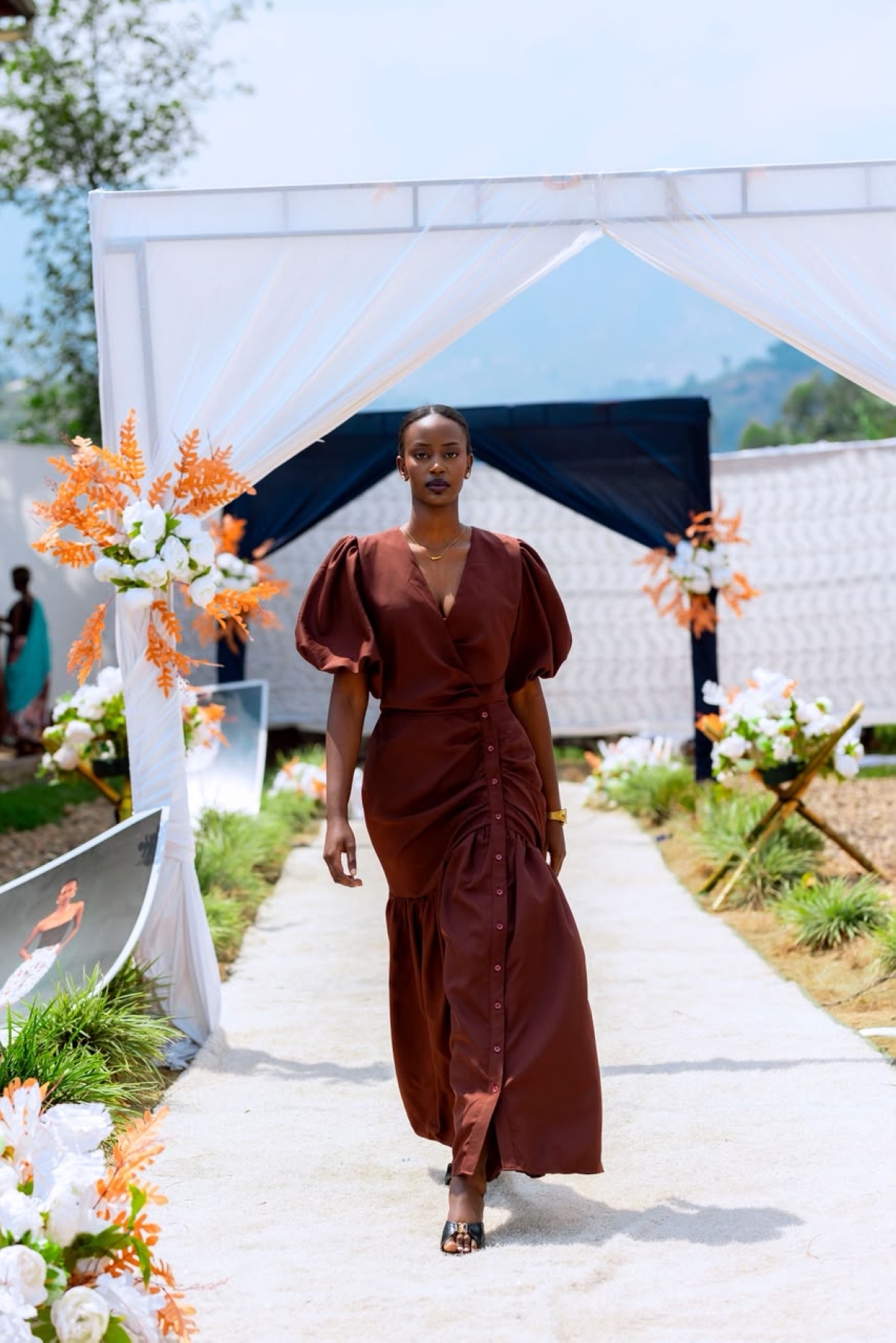 A model displays one of the outfits produced by OSO students during their training. Courtesy photo.