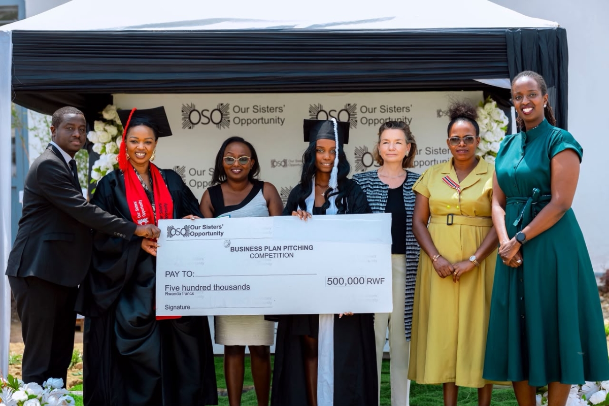 Victoria Muthoni (centre), the second-place winner for the best business project, poses with partners during the event. Courtesy photo.