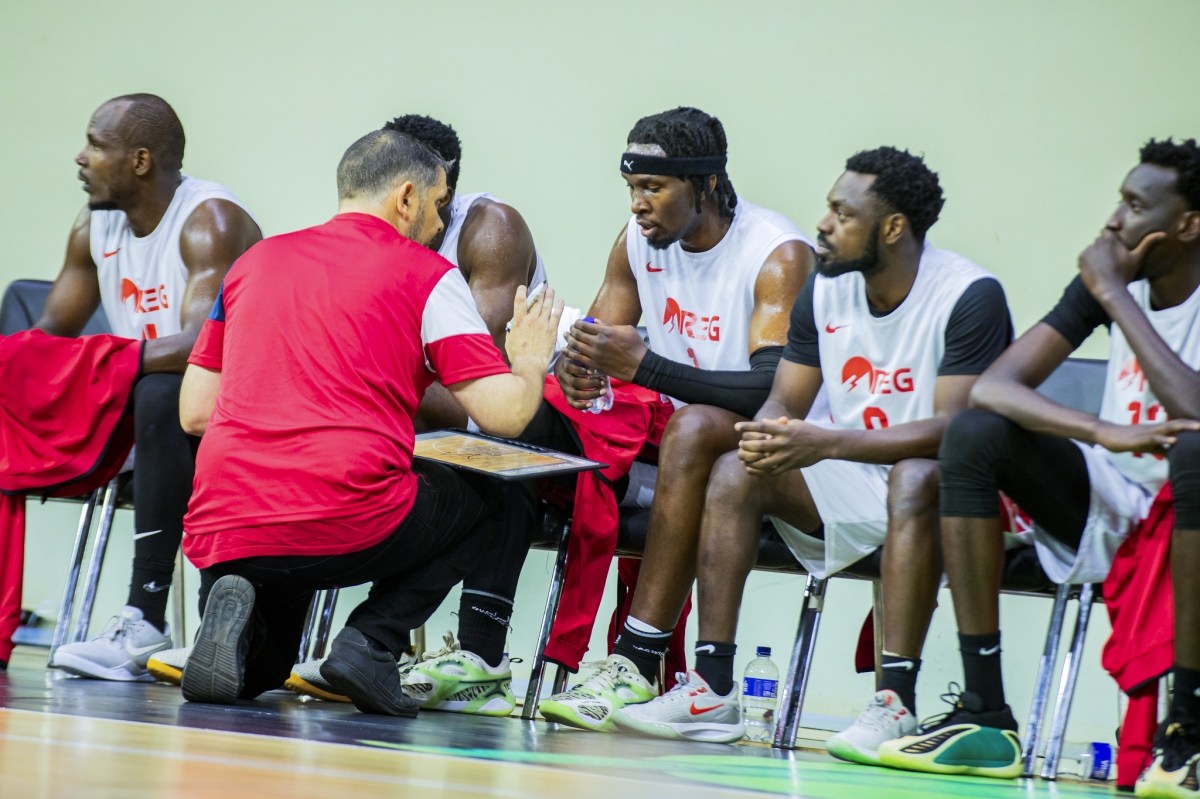 REG head coach gives instructions to the players. Photo by Mico Elvis Ndateba