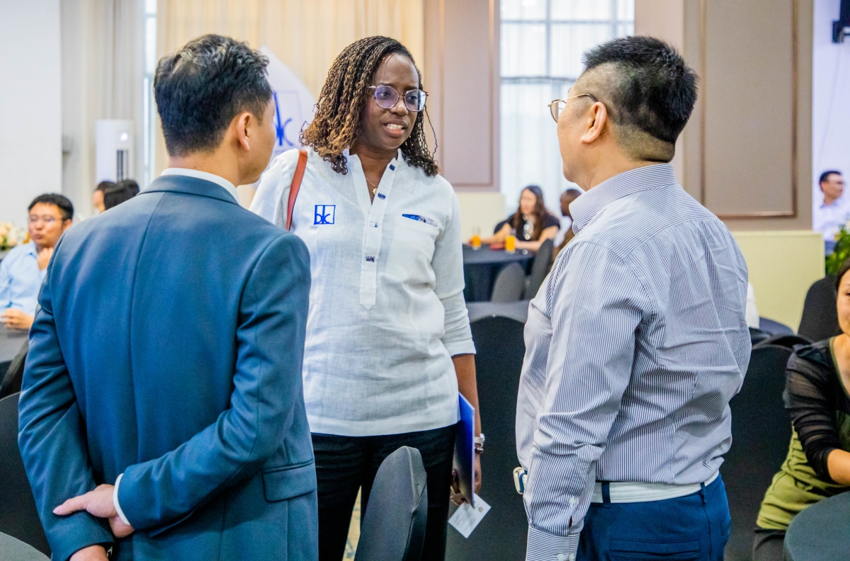 Bank of Kigali CEO Diane Karusisi interacts with delegates at the event.