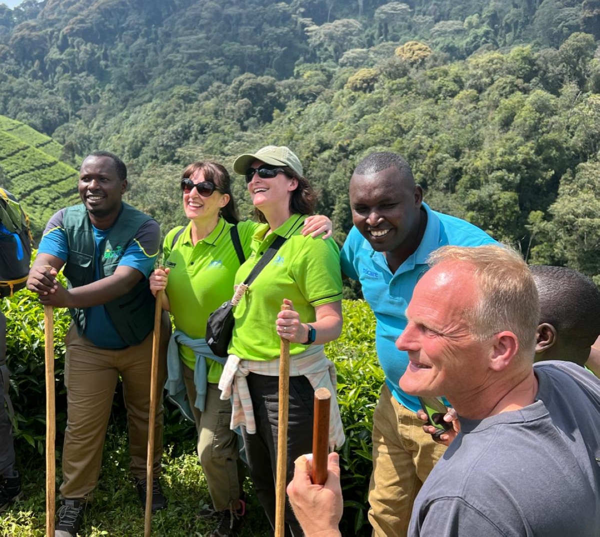 Imanishimwe and visitors pose for a group photo after touring Nyungwe forest.