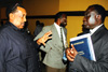 Prominent city lawyer, Francois Rwangampuhwe, chatting with Karugarama at Hotel Novotel yesterday (Photo/J. Mbanda)