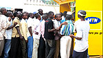A group of people queue to buy handsets at the MTN stand. This was during a recent Trade Fair in Kigali. (Photo/ E. Nsekanabo)