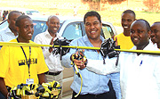 BCR and Western Union staff cutting a tape during the opening of  the Western Union branch at Nyamirambo. (Courtesy photo)