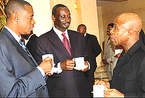 Gen. Kabarebe, Ugandau2019s Aronda Nyakayirima and DRCu2019s Kayembe chat during  the last meeting in Kigali. (File photo)