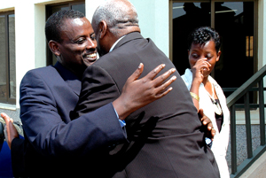 Kaka (left) being congratulated by a well-wisher shortly after his acquittal on September 21. (File photo)