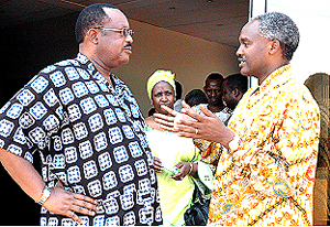 Kategeya and Murigande share a comment at Kigali Genocide memorial site in Gisozi.(Photo /G Barya)
