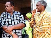 Eriya Kategaya and Charles Murigande, Foreign Affairs minister at Kigali Genocide Memorial site in Gisozi.