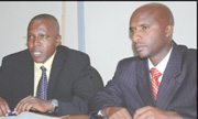 Robert Mathu, the executive director Capital Markets Advisory Council Secretariat (L) and Pierre Celestin Rwabukumba, the operations manager. (Photo / G Barya)