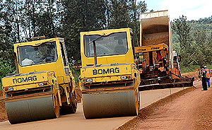 The Kicukiro-Nyamata-Nemba Road which Members of Parliament say developed potholes shortly after its construction. Inset is Minister Kamanzi. (File photo)