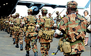 Members of the RDF 4th battalion board a US jet at Kigali International Airport on their way to Darfur, Sudan on Saturday.  (Photo/ G. Barya)