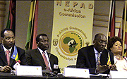 Albert Butare, Rwandan Minister of State for Energy and Communications (L), Dr. Henry Chasia, Executive Deputy Chairperson, NEPAD e-Africa Commission Dr. Ham Mukasa Mulira, Ugandan ICT minister addresses a press conference in Johannesburg and Patricia Kal