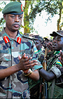 Gen. Kabarebe acknowledges applause from RDF peacekeepers who returned from Darfur recently. (File photo)