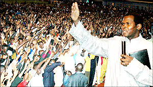 Pastor Robert Kayanja preaching  at Amahoro National Stadium last evening. (Photo / G. Barya)