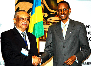 President Paul Kagame shakes hands with the Renu00e9 Radembino-Coniquet, the co-president of the ACP-EU Joint Parliamentary assembly after the official opening at Serena Hotel yesterday. (Photo/ G.Barya)