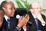 Musoni and Louis Michel at Finance ministry offices on Thursday. (Photo/G. Barya)