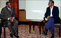 President Paul Kagame and Angola deputy Minister of Foreign Affairs, Dr George Chicoti at Kigali Serena hotel yesterday. (Photo/ J. Mbanda)