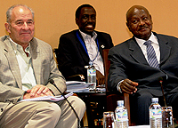Mc Kinnon and Ugandau2019s President Yoweri Kaguta Museveni during the Chogm sports breakfast at the Munyonyo Commonwealth Resort on Saturday. (Courtesy photo)