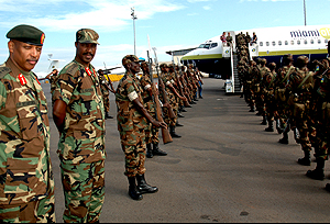 RDF Chief of Logistics (J4) Maj. Gen. Patrick Nyamvumba (L) and Lt. Gen. Kayonga see off the the first group of the last battalion for the AU mission in Darfur. (Photo/J. Mbanda)