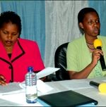 Minister Nyirahabineza (left) with the TRACu2019s Asimwe at Terracom House, Kacyiru yesterday. (Photo/ J. Mbanda)