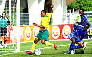 HAT TRICK HERO: Labama Bokota Kamana scores the first of his three goals against hapless Djibouti on Thursday.