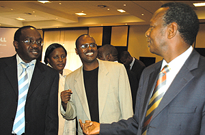 State Minister in charge of Water and Mines, Prof. Bikoro Munyanganizi (right) shares a light moment with Mayors Franu00e7ois Byabarumwanzi (left) and Jean Paul Munyandamutsa, at Kigali Serena Hotel yesterday (Photo G. Barya)