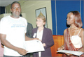 GALLANT: Ntamfurigirishyari receives a certificate of recognition from Birgit Otte (centre) of Hamburg Institute for Social Research at the function. (photo / J. Mbanda)