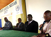 Health Minister Dr Ntawukuliryayo (C), Prof. Laurent Nkusi, the Minister of Information in the Prime Ministeru2019s office at media-health awards ceremony at Hotel Novotel on Friday. (Photo/F.Mutesi)