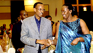 President Kagame congratulating the First Lady after she had finished handing out the awards at Kigali Serena Hotel. (PPU photo)