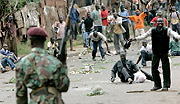 An Army man in Kenya standing against angry protesters.  (Courtsey photo)