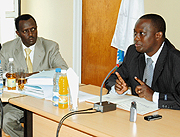 Rugemintwaza (right) and Ntwali during the meeting at the Ministry of Local Government headquarters yesterday. (Photo/J. Mbanda)