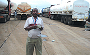 Patrick  Mugwanya sees fuel tankers enter Uganda from Mombasa.